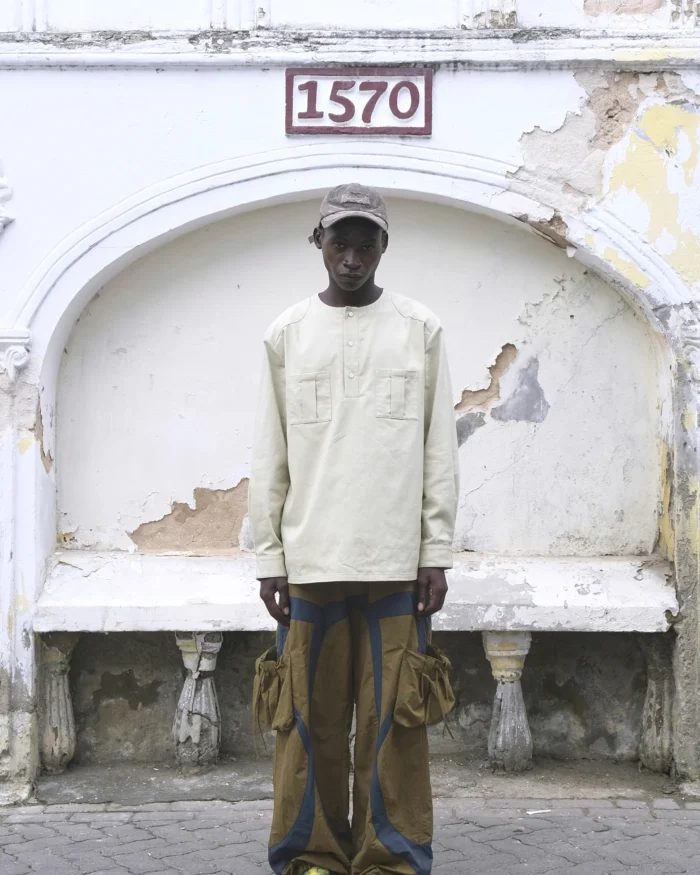 “Umoja” CUT-OUT POCKET NYLON PANTS 01