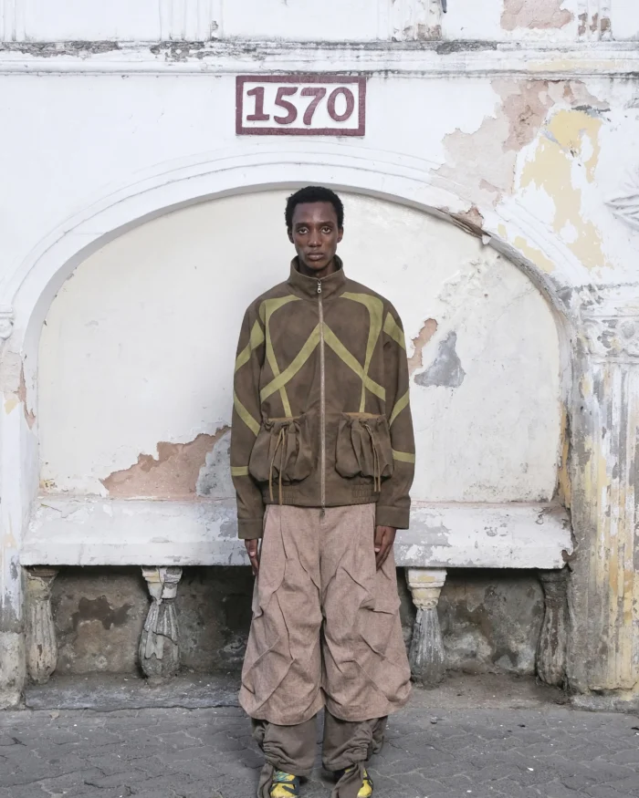 “Umoja” CUT-OUT POCKET FAUX- LEATHER JACKET
